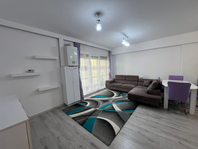 Apartament 3 camere + garaj ,76 mp, finisat  si mobilat,in cart Europa 