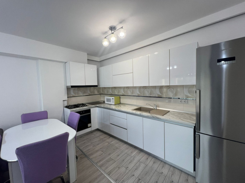 Apartament 3 camere + garaj ,76 mp, finisat  si mobilat,in cart Europa 