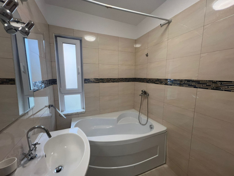 Apartament 3 camere + garaj ,76 mp, finisat  si mobilat,in cart Europa 